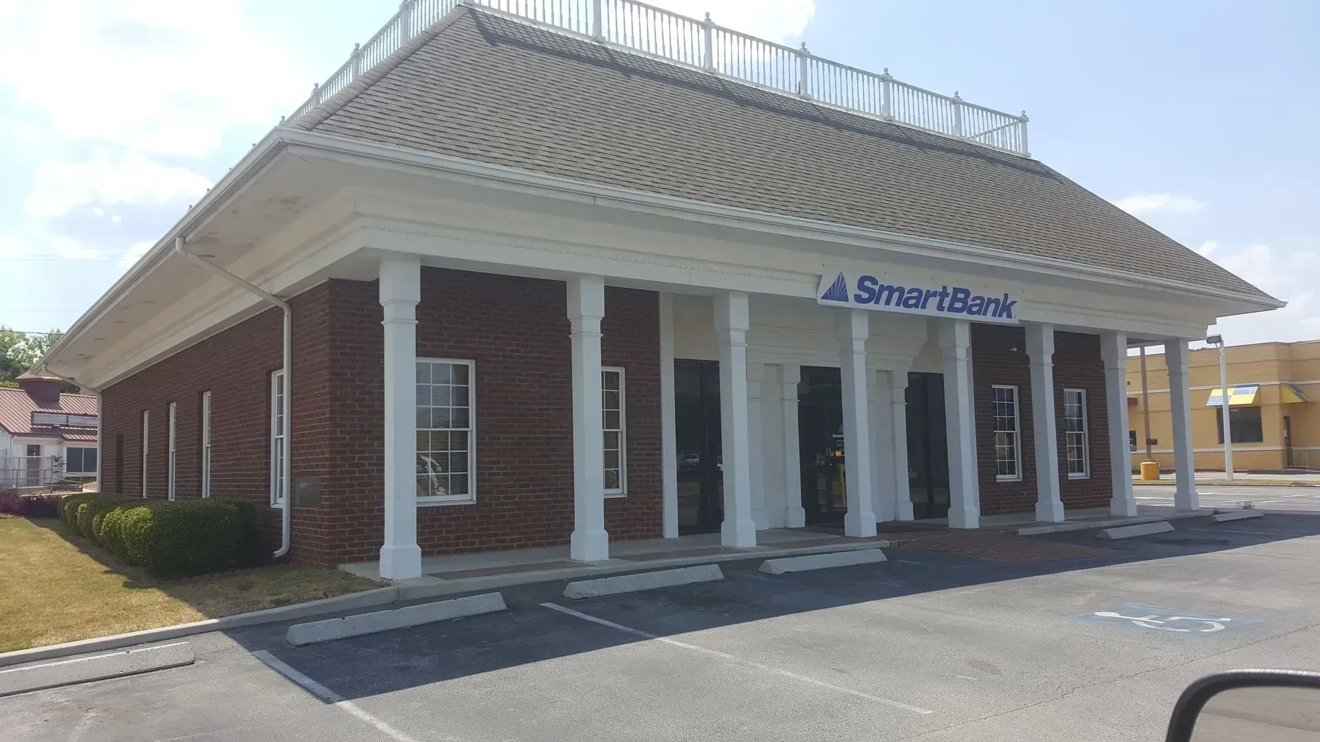 Brick building with white columns, 