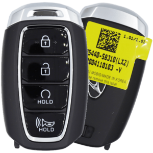 The front and back of a car key that says hold on it