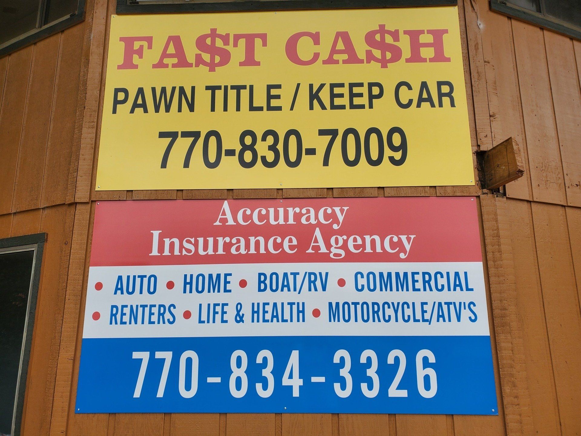 Photo of Fast Cash sign and phone number