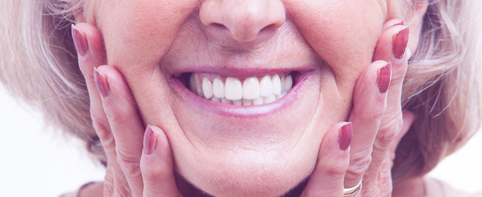 white teeth of an elderly woman