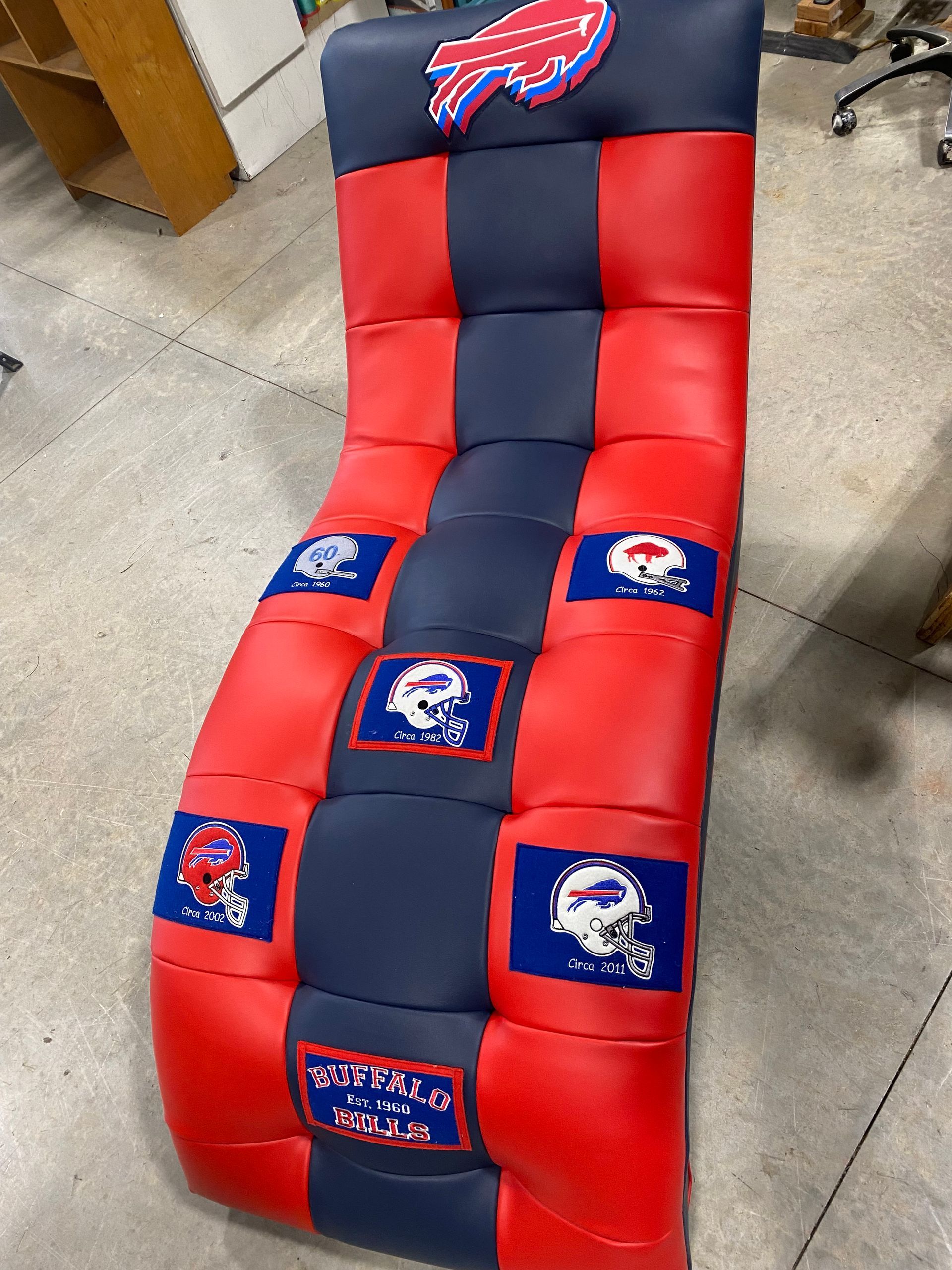 A floor chair in Buffalo Bills team colors (red and blue) with team logos.