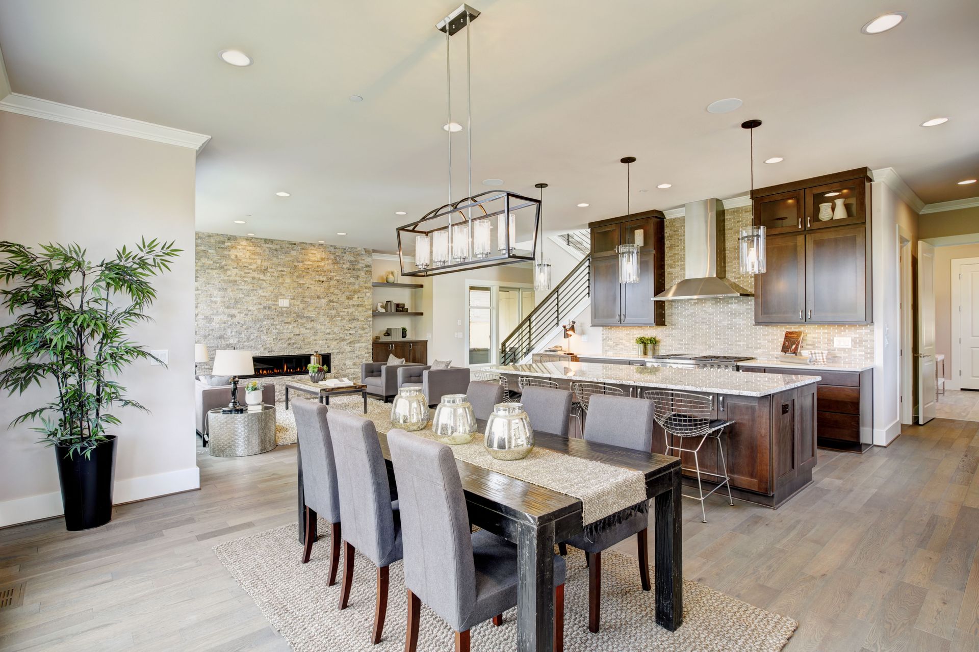 there is a dining room table and chairs in the middle of the room