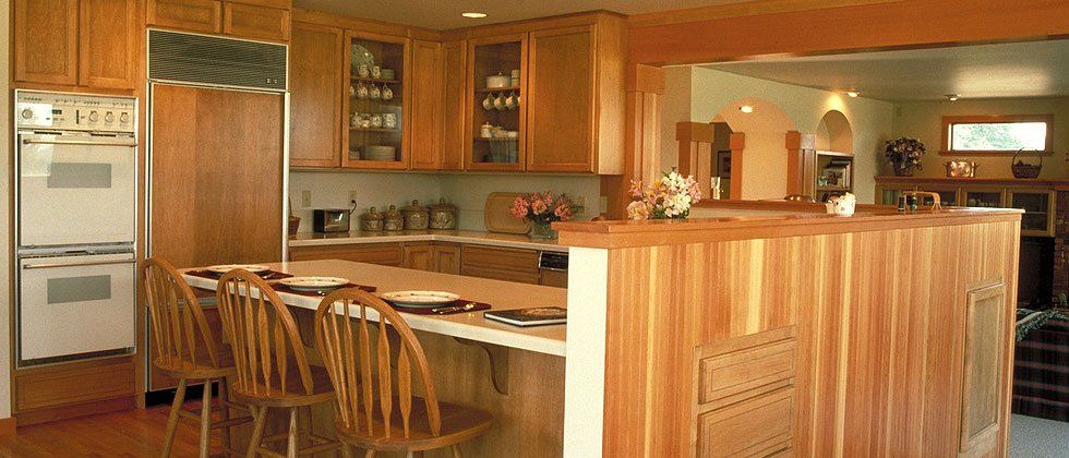 beautiful kitchen with custom oak cabinets