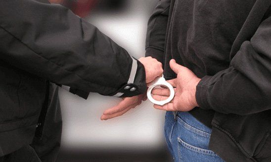 Man arrested with handcuff