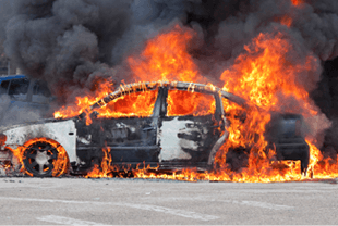 Car on fire in a highway accident