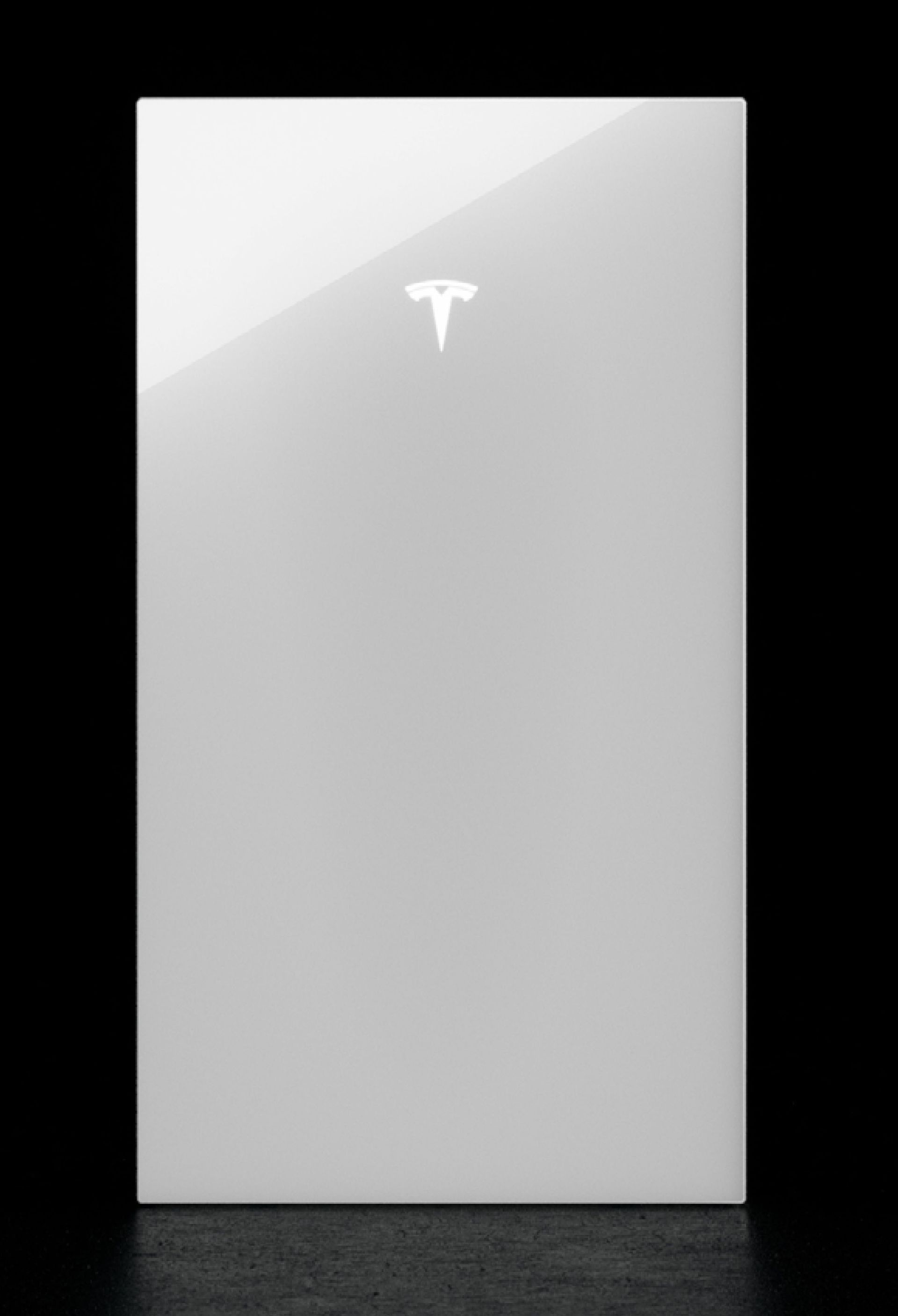 White Tesla-branded box or package on a black background