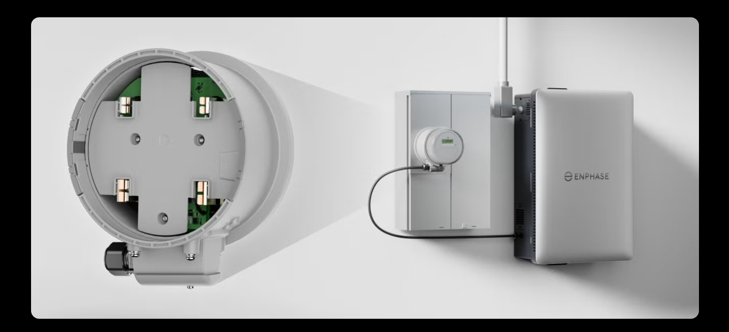 Circular wall-mounted device with open front, showing internal components and a gray side module