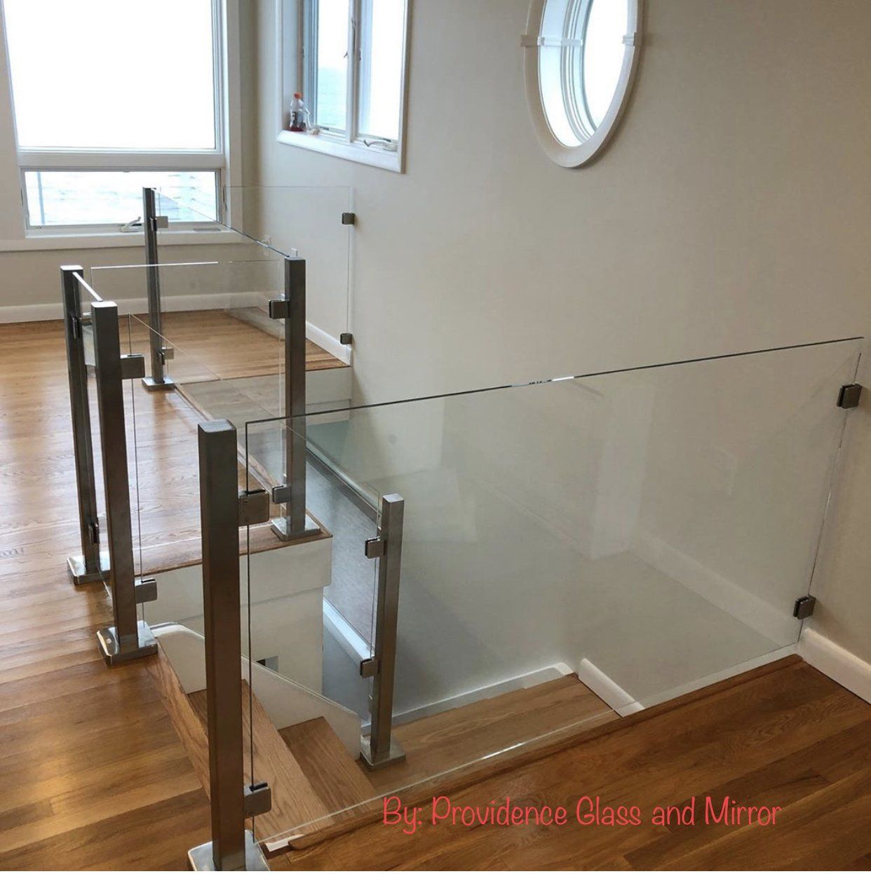 Glass stair railing