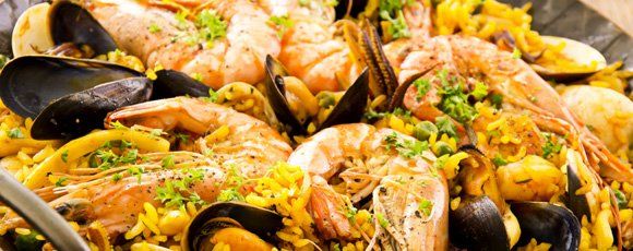 seafood with rice, shrimp, and mussels