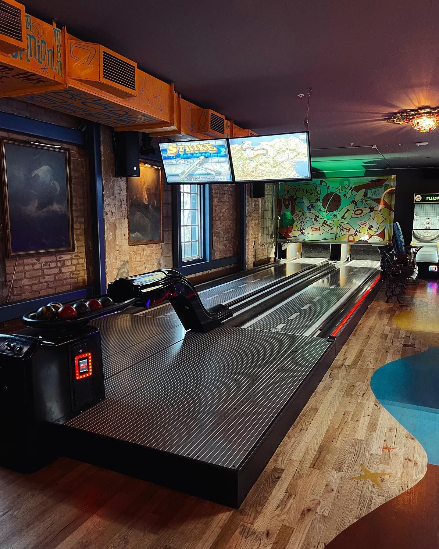 there is a bowling alley in the middle of the room