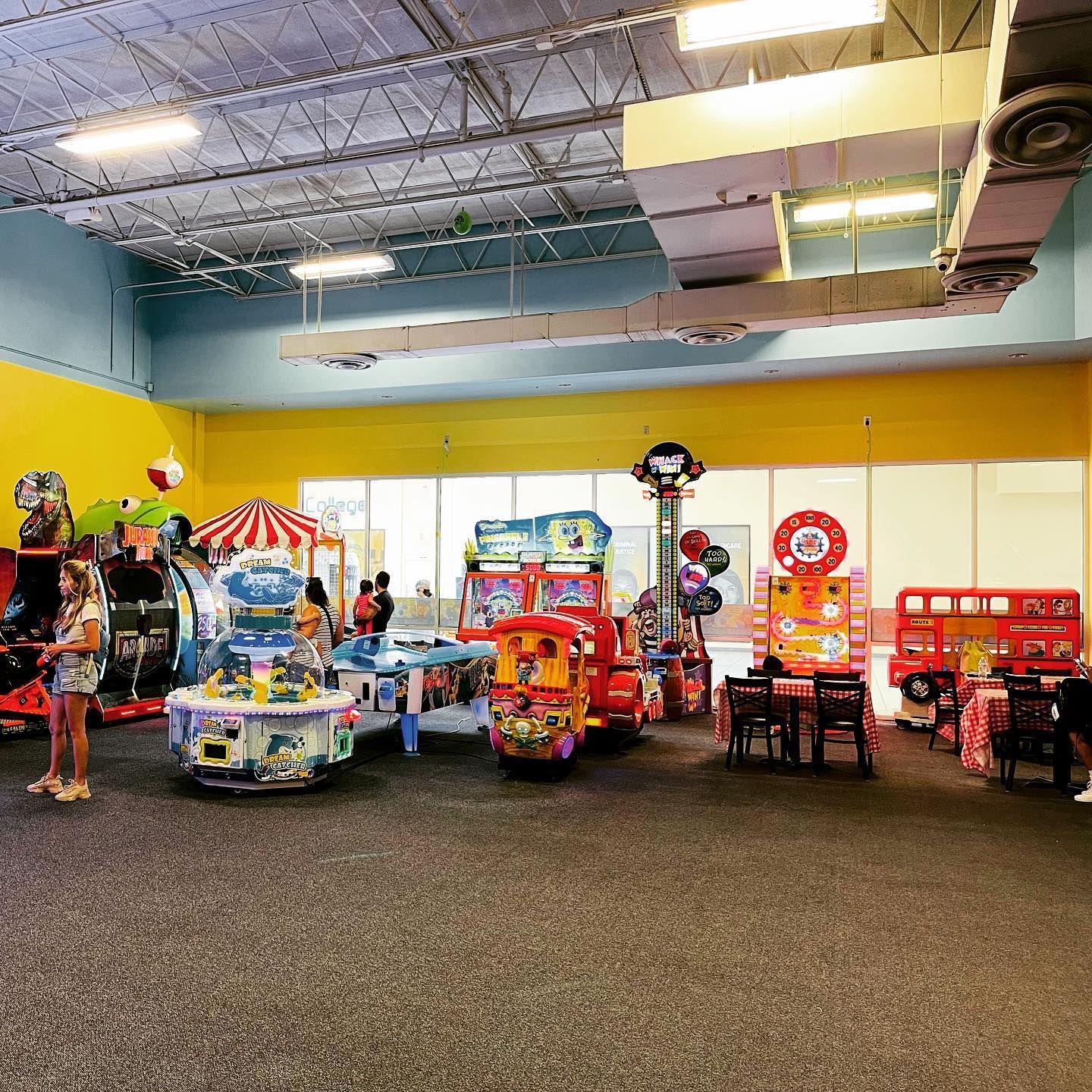 there are a lot of arcade games in this room