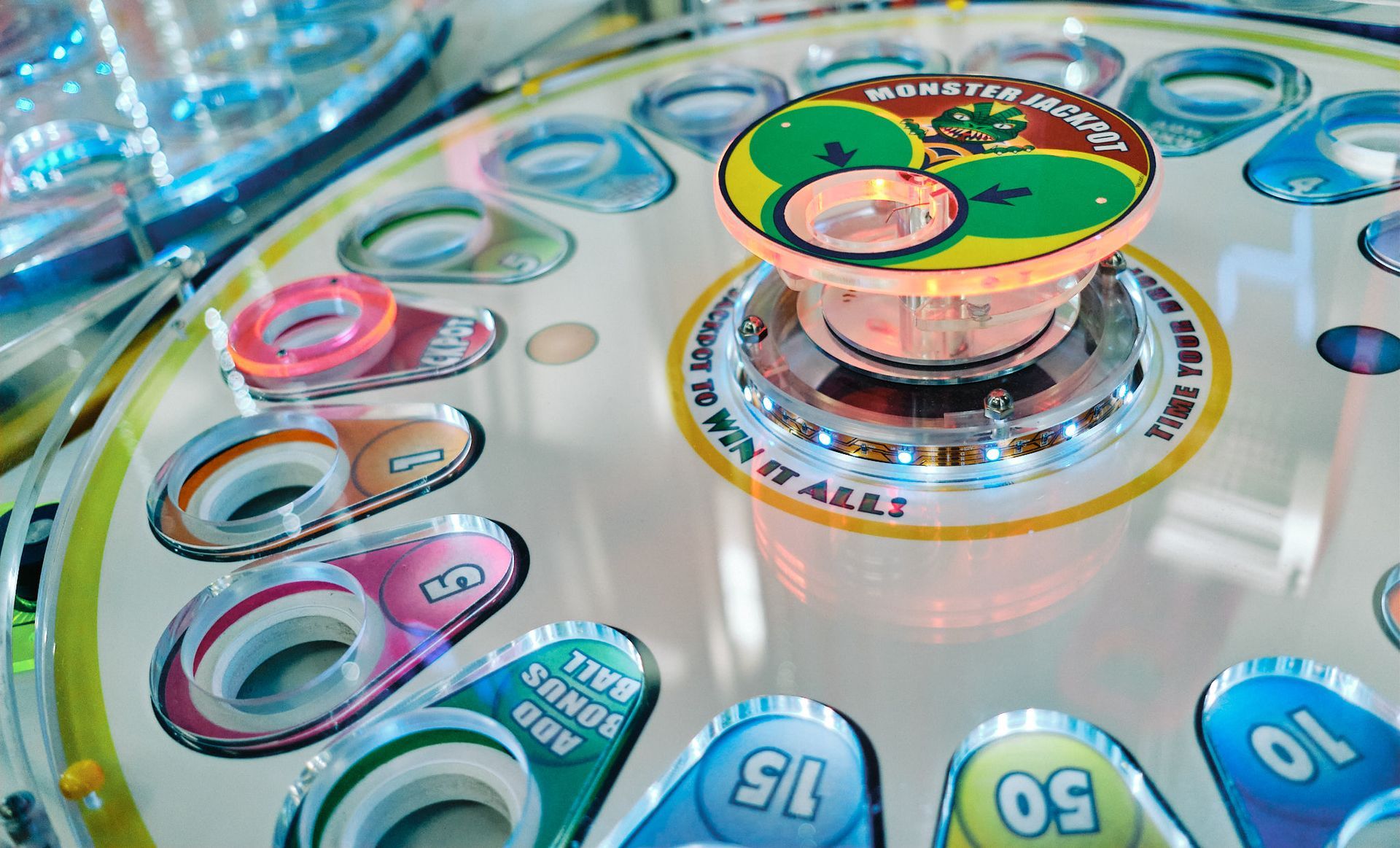 a close up of a pinball machine with the number 15 on it