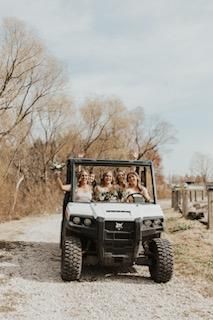 Wedding entourage riding on the truck