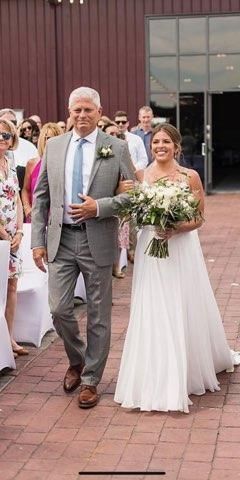 Father and bride walking