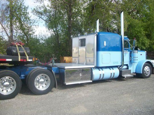 A blue semi truck