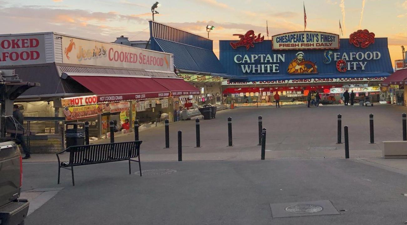 Breaking ocean wave, turquoise water, white foam, aerial view.