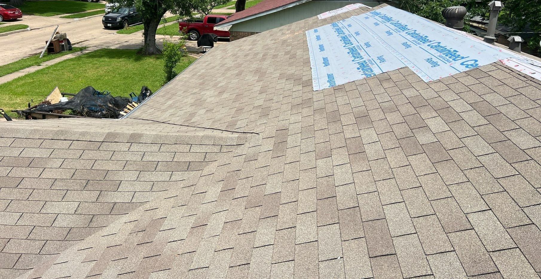 Keller Texas based, Becker Roofing completed a residential house inspection in North Texas - Tarp leaking roof due to storms incoming