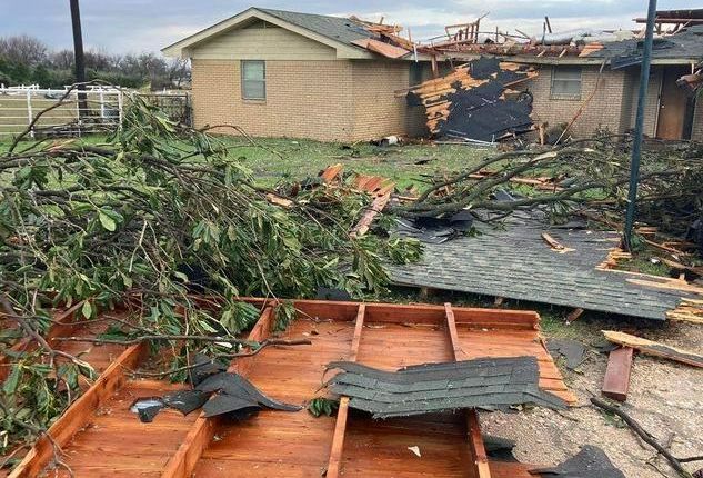 Tornado Damage to roofing and fence