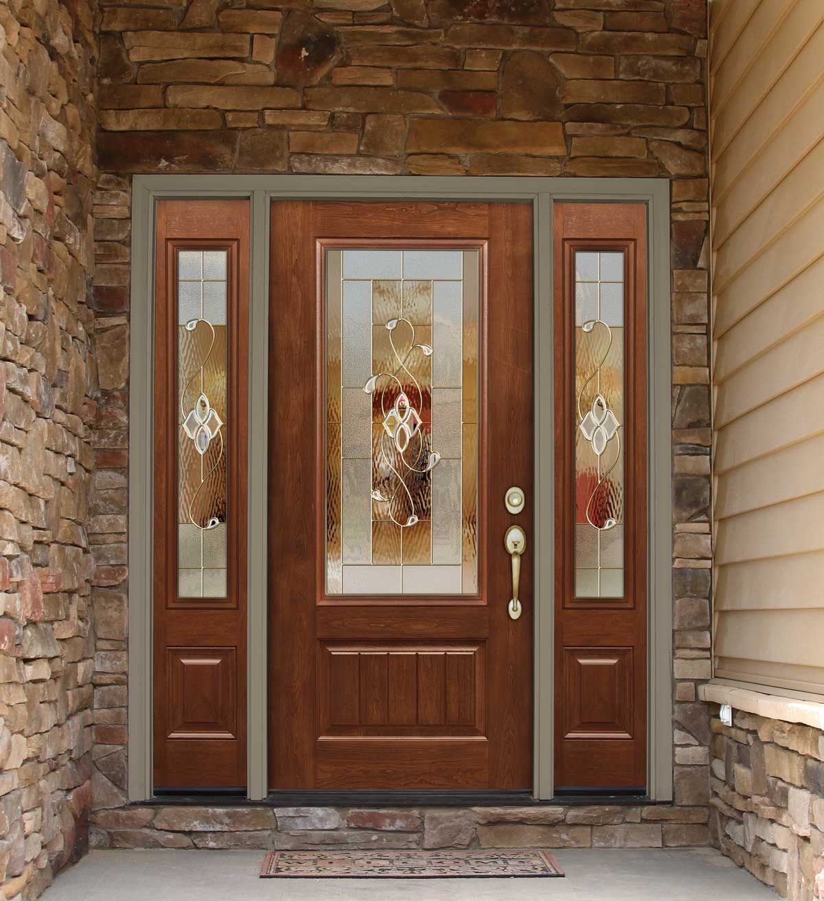 A wooden door with a stained glass window