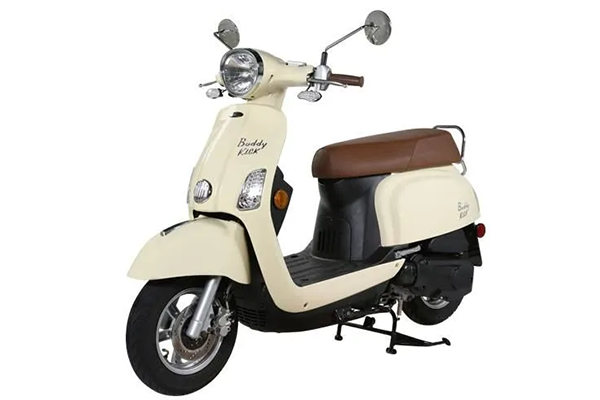 Cream-colored retro scooter with brown seat and mirrors, shown on a white background