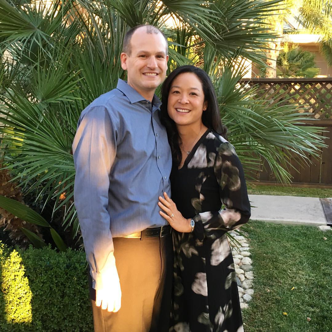 Patient sitting at dental chair smiling