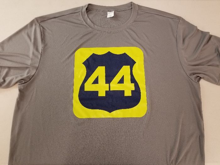 a grey shirt with the number 44 on it
