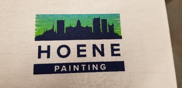 a white shirt with the Hoene Painting logo on it