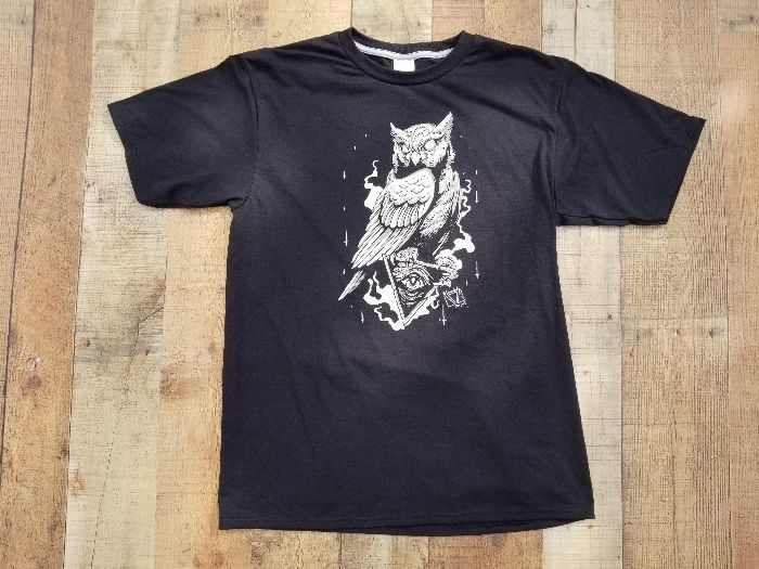 a black t-shirt with an owl on it
