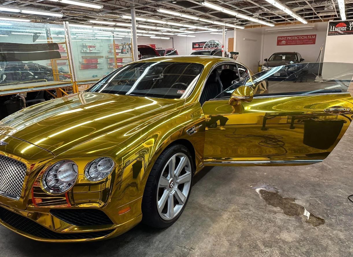 gold Bentley with windows tinted 