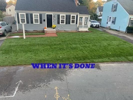 Suburban house with a neatly edged green lawn and purple text reading “WHEN IT’S DONE” over the street
