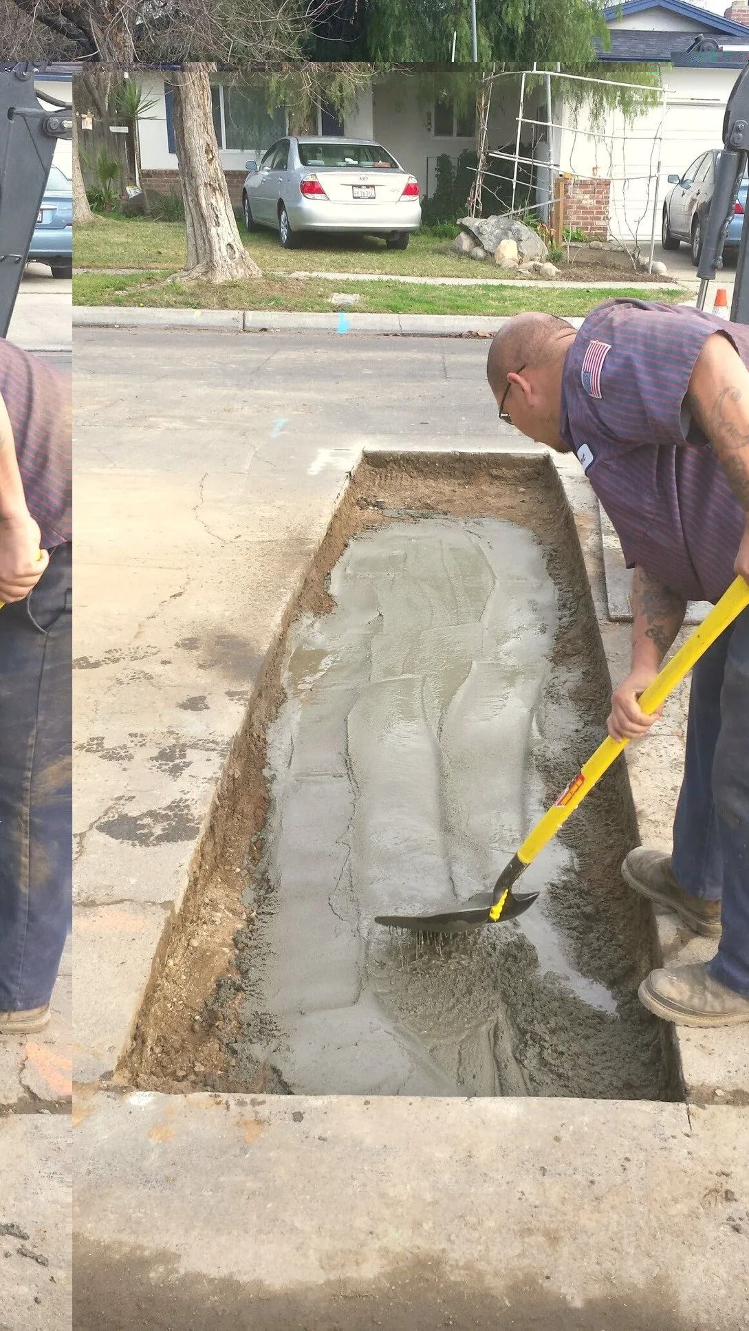 Man pouring concrete into a curb trench on a residential street.