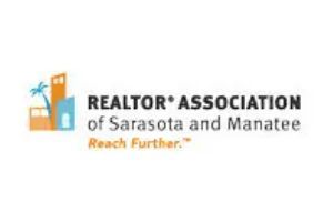 Logo for the Realtor Association of Sarasota and Manatee; stylized buildings and palm tree with text.