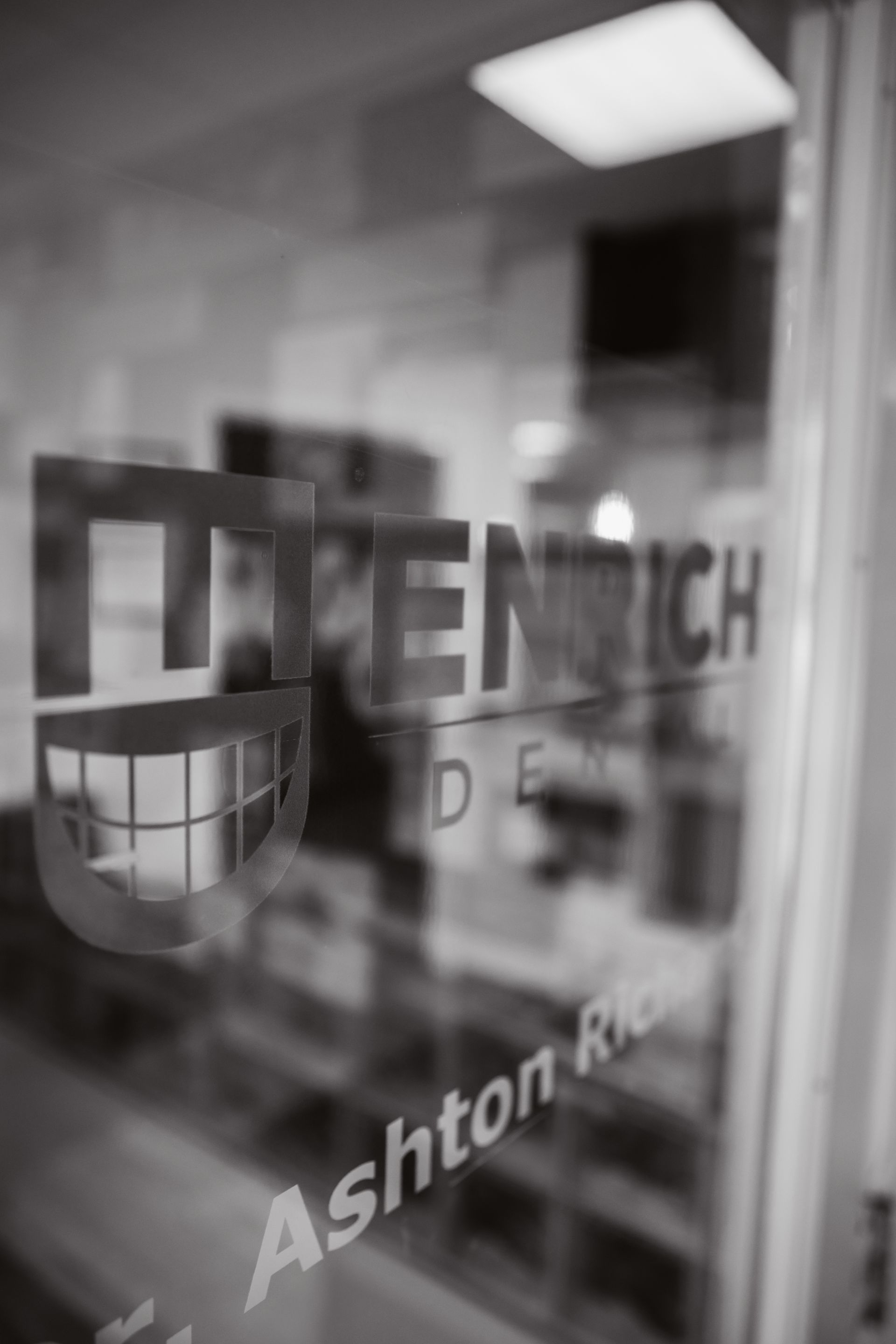 A black and white photo of a dentist 's office