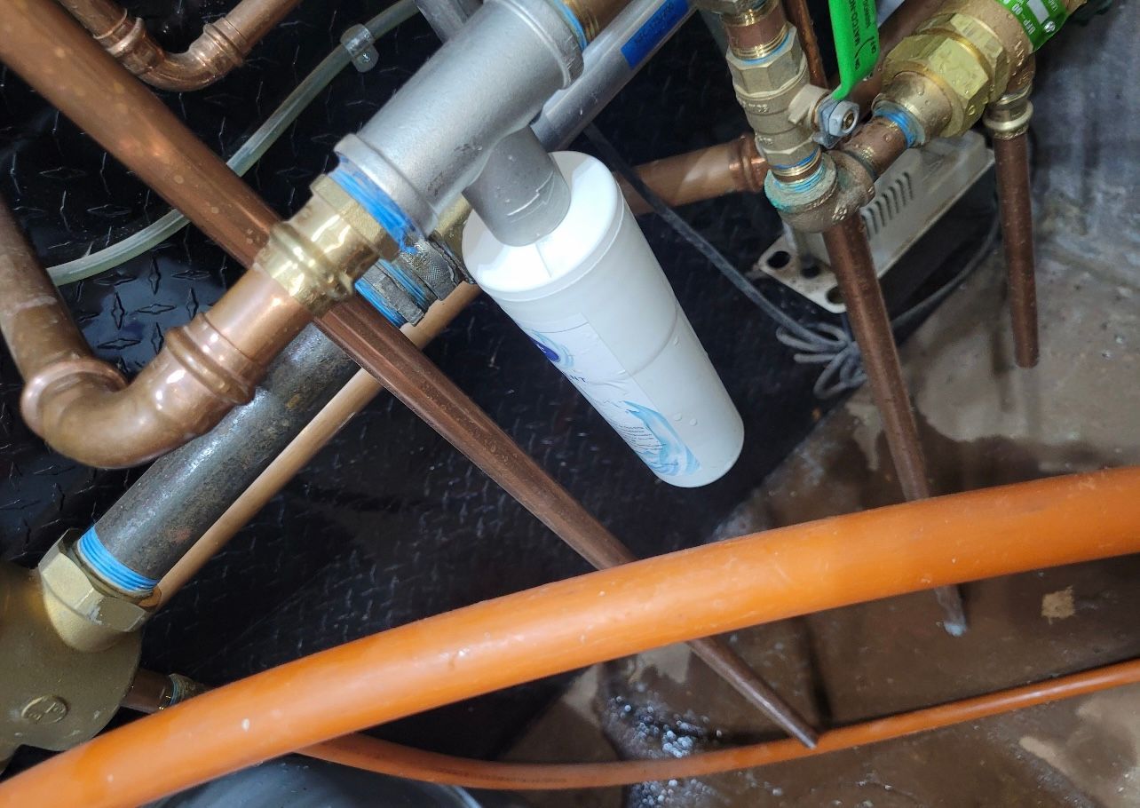 a bunch of copper pipes are connected to each other