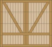 Wooden barn door with diagonal bracing and vertical slats, viewed straight on
