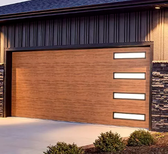 Modern wood-paneled garage door with four narrow windows on a stone-and-stucco house