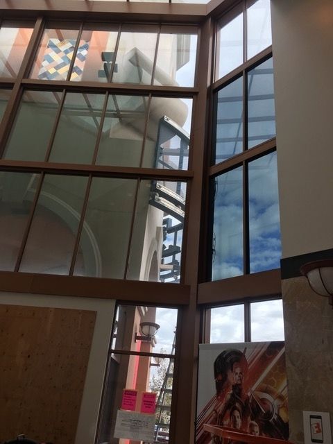 A building with a lot of windows and a sign that says ' a ' on it