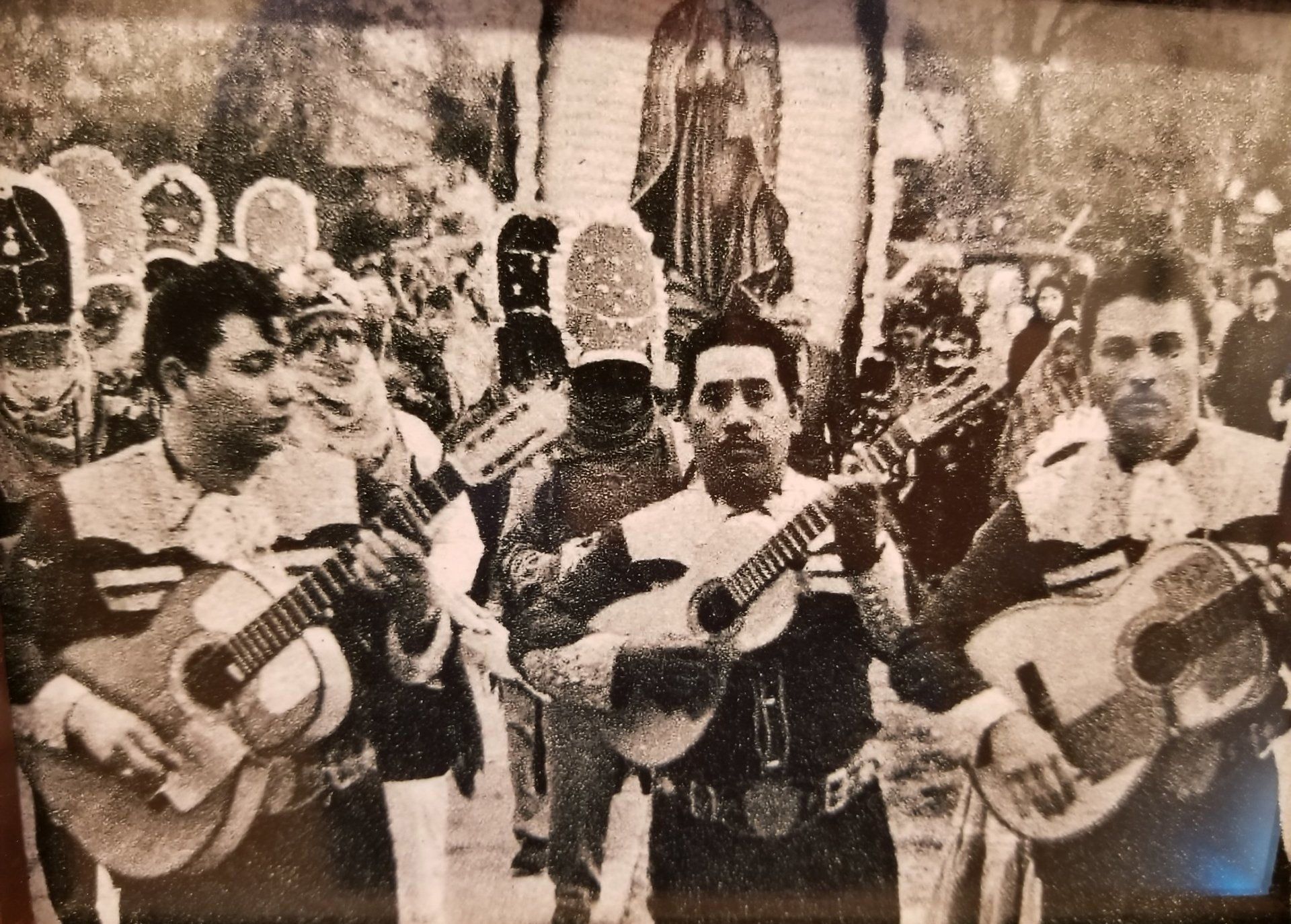 People parading the Lady of Guadalupe