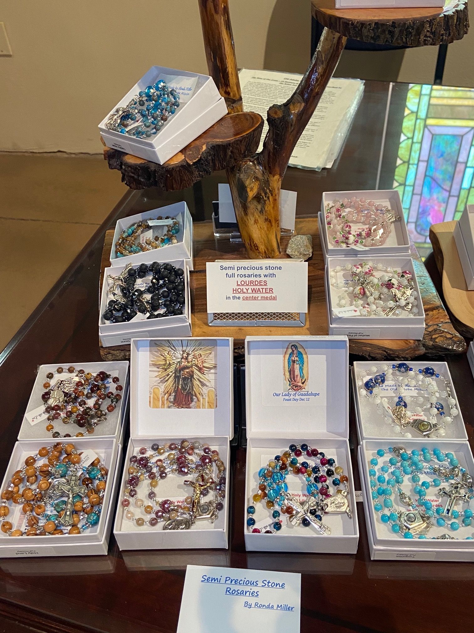 A table with a bunch of bracelets on it