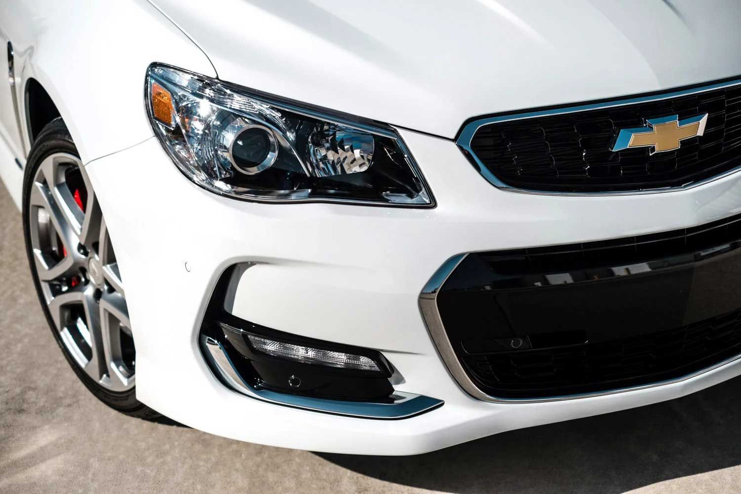 White Chevrolet SS sports car front end detail.