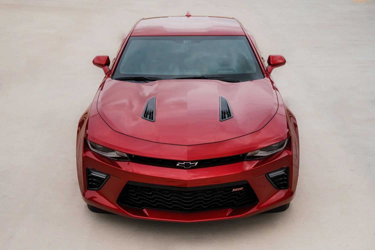 Red Chevrolet Camaro from a high-angle view, showing the hood, headlights, and front grille.