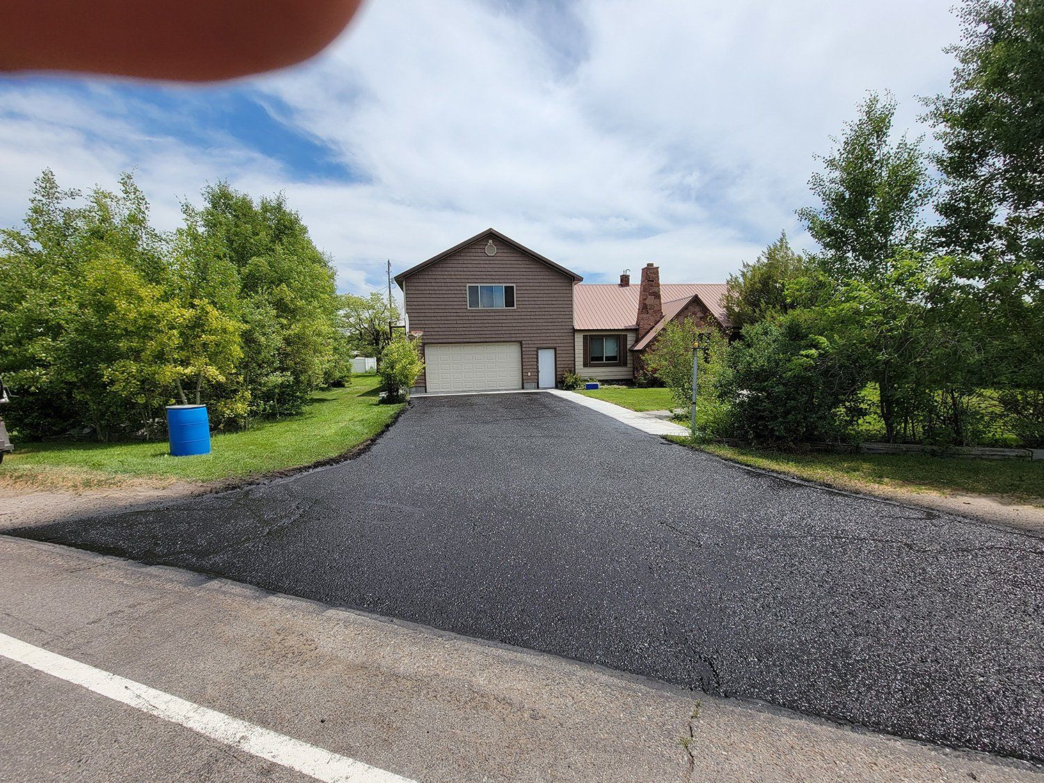 Residential driveway asphalt paving