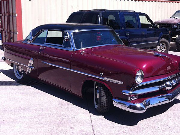 a newly polished vintage car