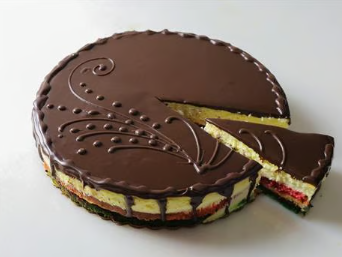 Chocolate-glazed layered cake with a slice cut out, decorated with swirled icing