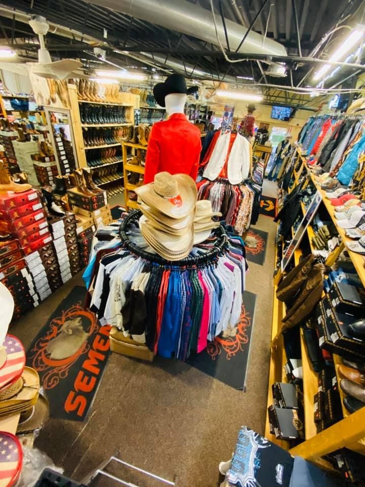 A store filled with lots of clothes and hats.