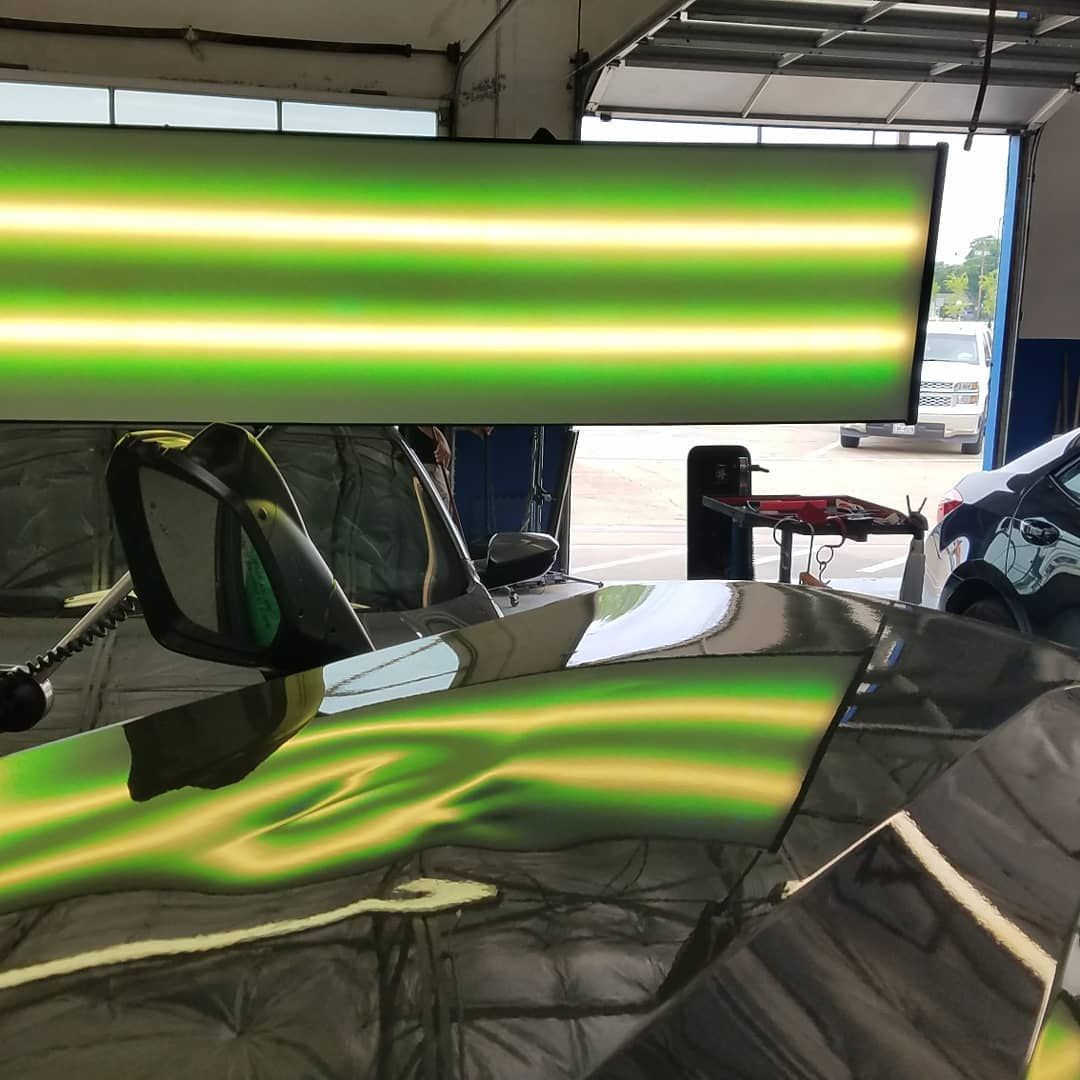 A car with a green light on top of it