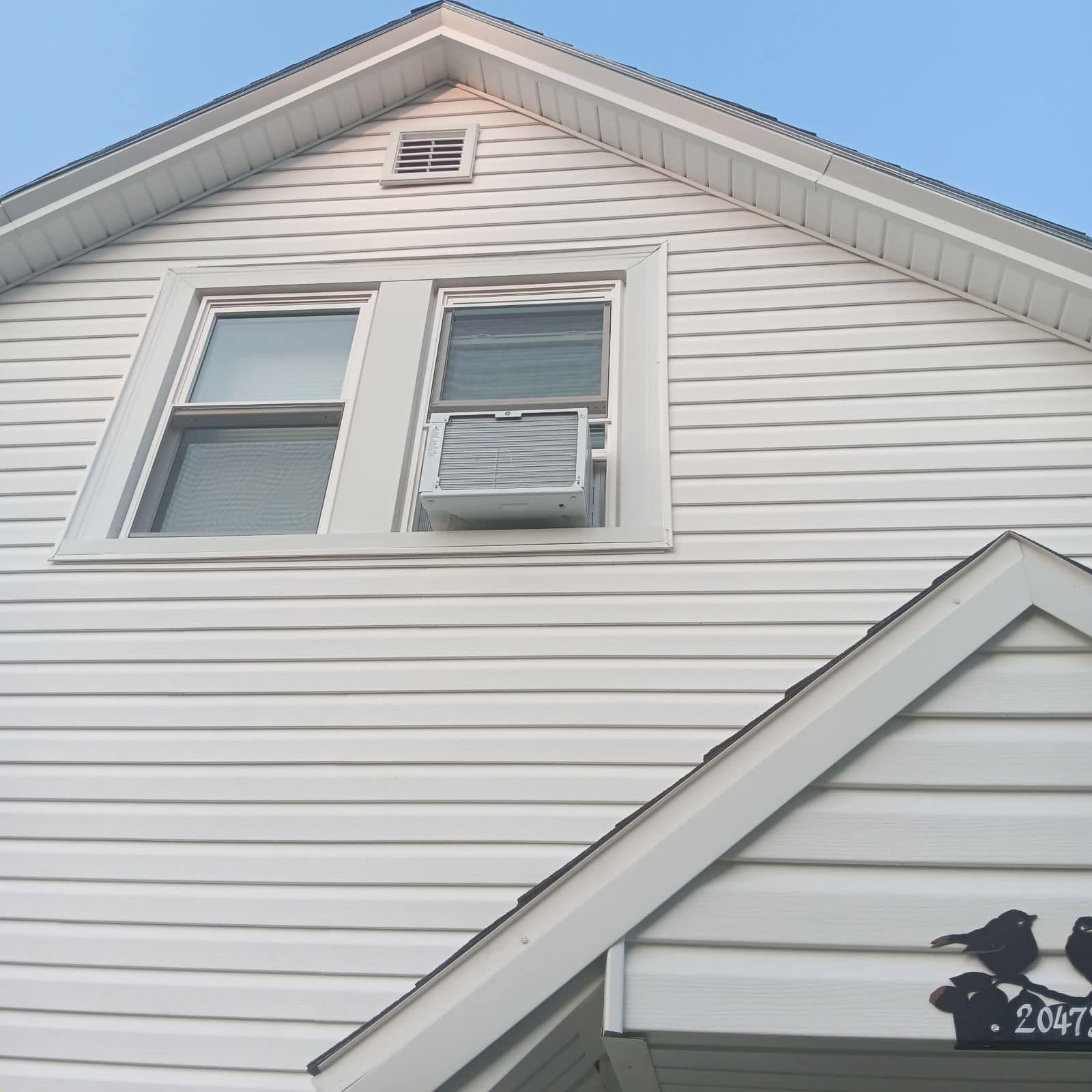 A house with white siding.