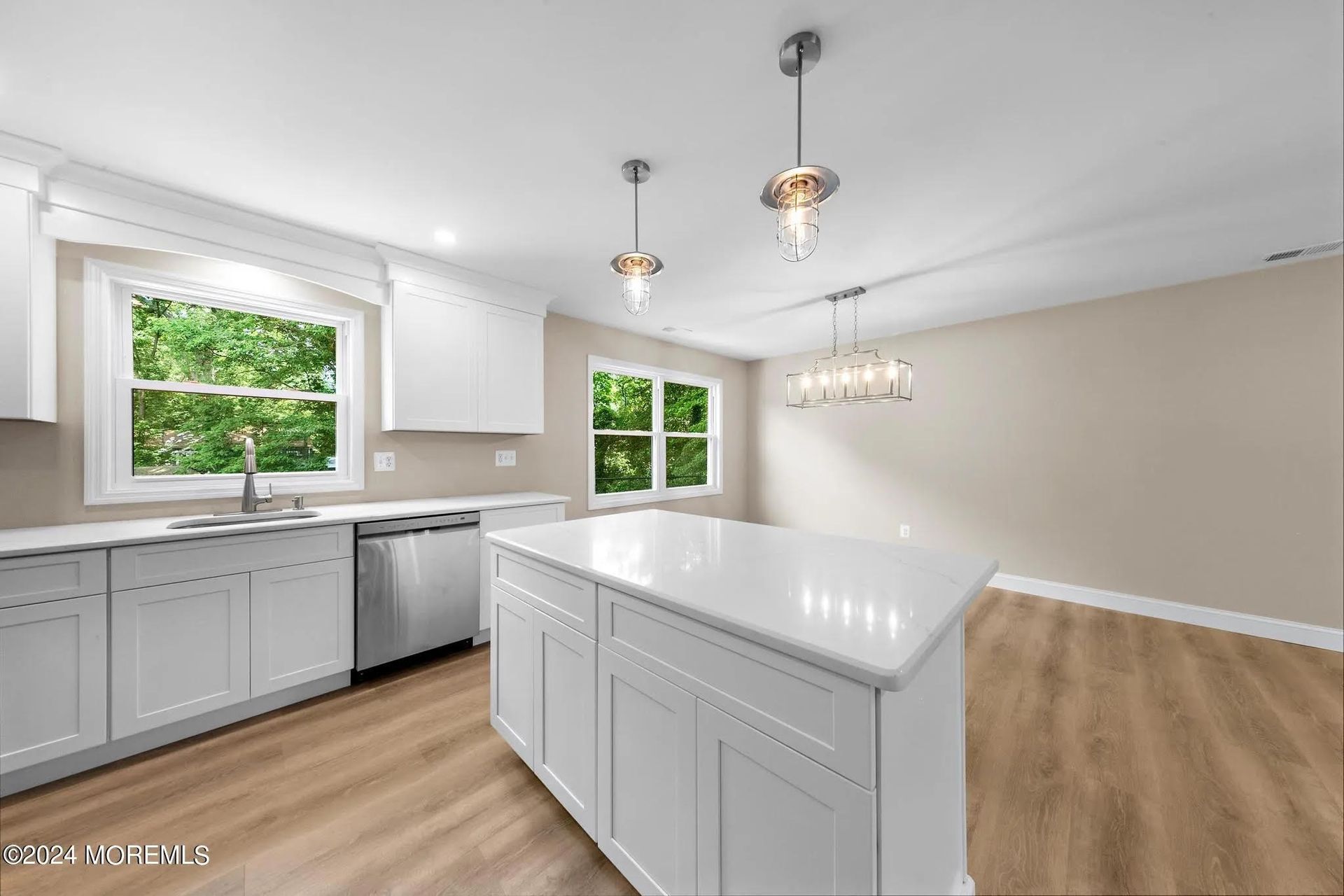 There is a large island in the middle of the kitchen.