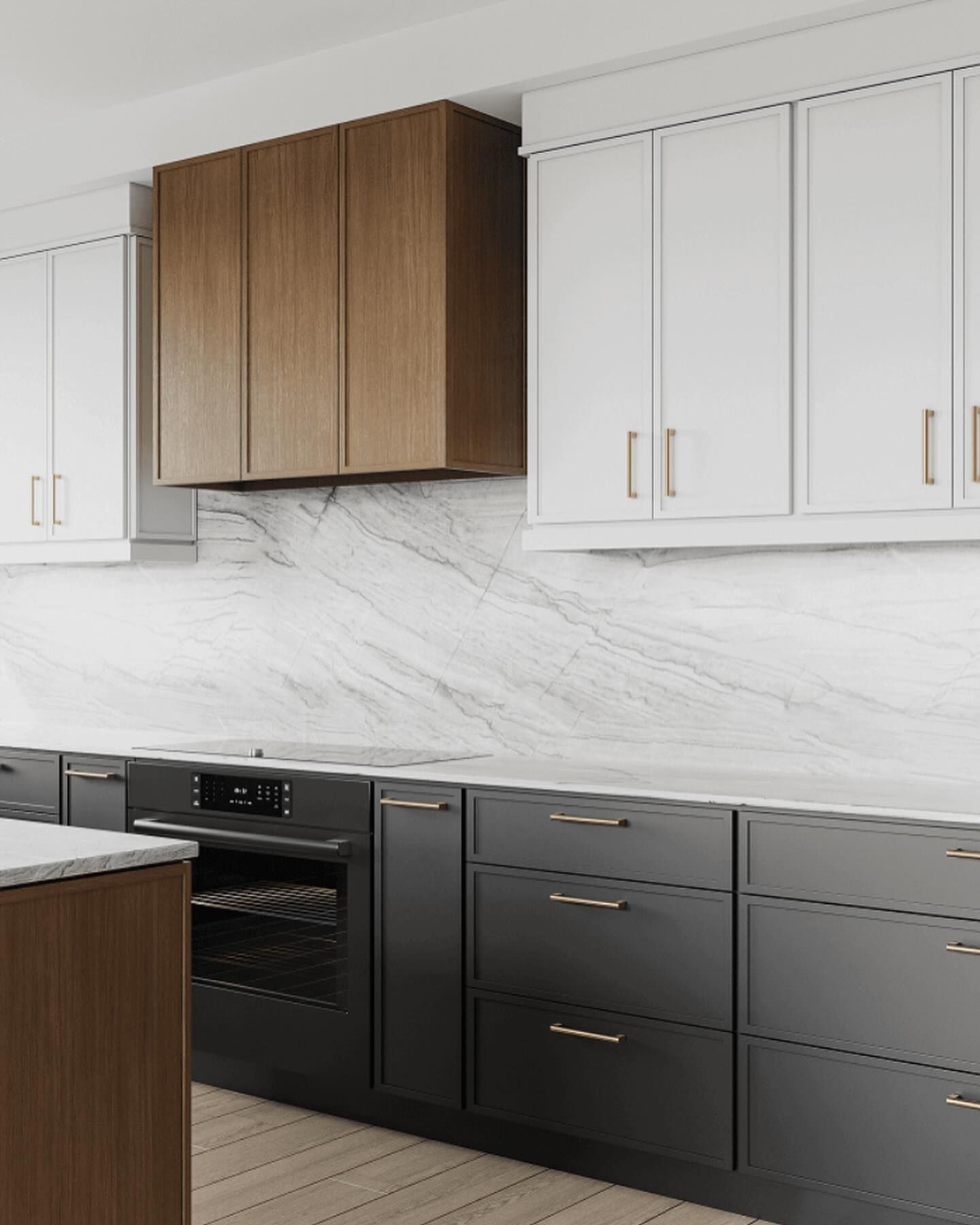 A kitchen with black cabinets and white cabinets and a marble counter top