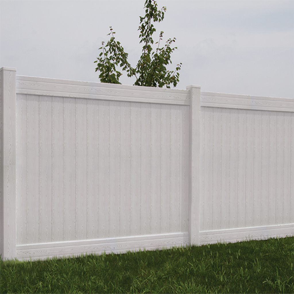 A white fence with a tree in the background